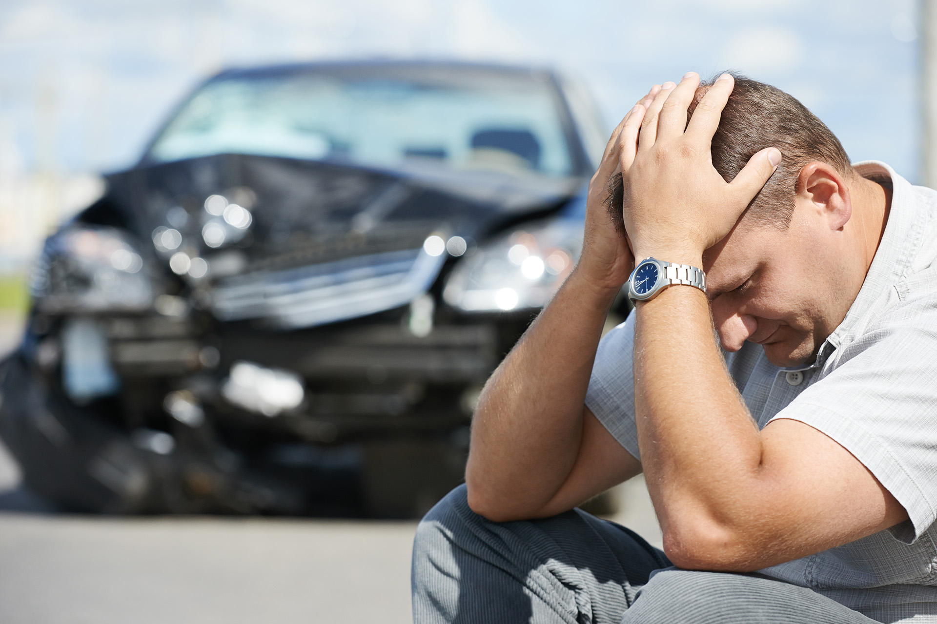 Distressed Man at Accident Scene